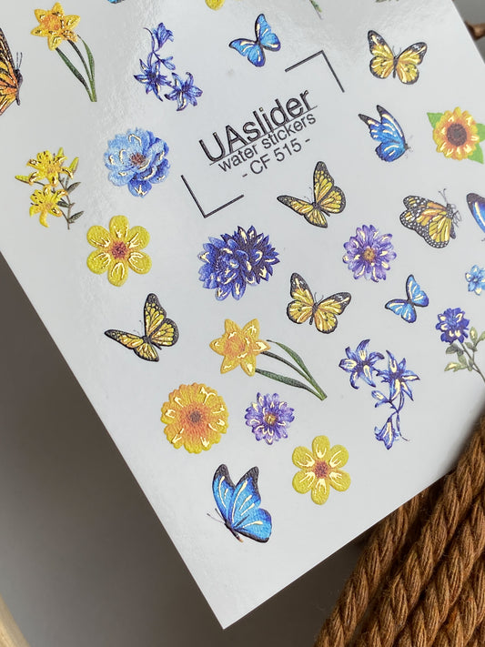 Nagel Wasserabziehbild CF-515 | Wasserfolien Nagelabziehbilder mit blauen & gelben Blumen und Schmetterlingen | Sommerliche florale Nagelkunst