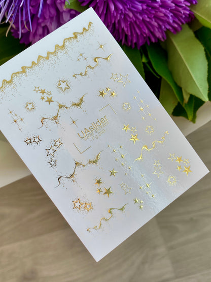 Nagel-Wasserabziehbild Fg-293 | Wasserabzieh-Nagelaufkleber mit goldenen Sternen | Elegantes sternenübersätes Design