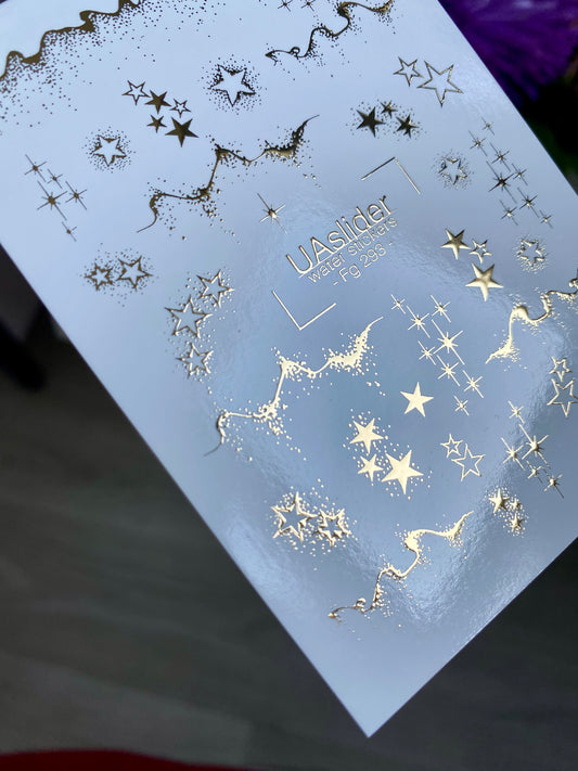 Nagel-Wasserabziehbild Fg-293 | Wasserabzieh-Nagelaufkleber mit goldenen Sternen | Elegantes sternenübersätes Design